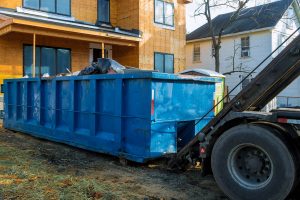 dumpster near a home